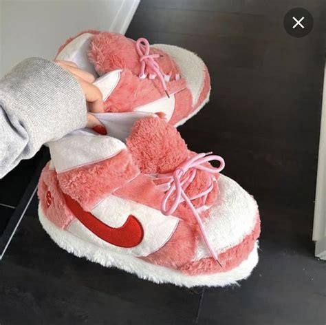 fuzzy nike slippers.